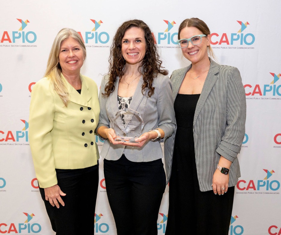 Christine Kohn, Brie Coleman, and Julia Griffin accepting the CAPIO EPIC Award for the Loomis Demonstration Garden video